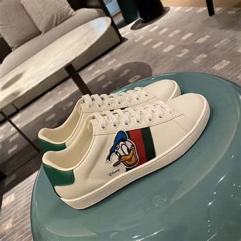 gucci donald duck jacket|gucci ace donald duck shoes.